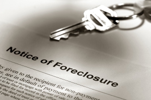 Real estate lender foreclosure notice with house key